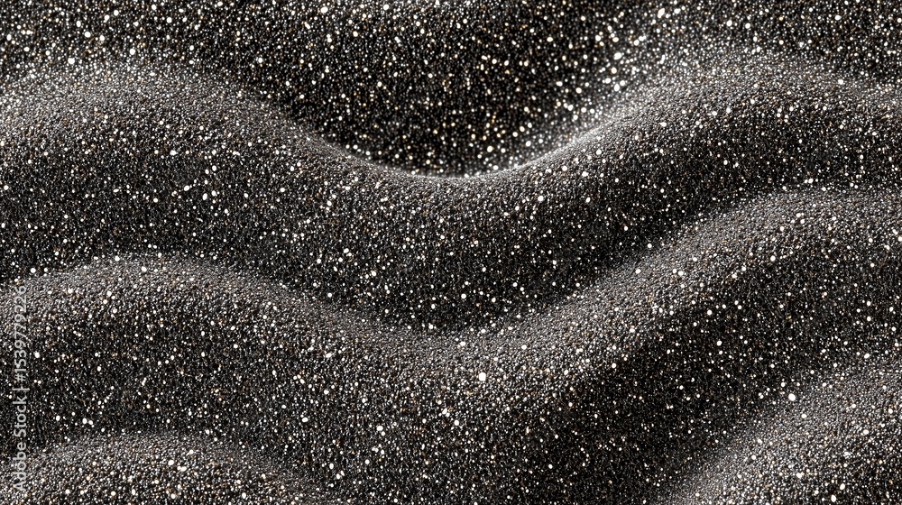 Poster textured black sand surface with shimmering particles creating a captivating natural pattern
