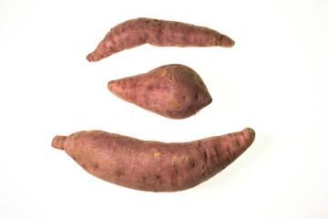Organic grown sweet potato with its odd shapes and sizes due to no pesticides and man made chemicals