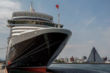 Classic ocean liner cruiseship cruise ship Elizabeth in port of Aomori, Japan with skyscraper...