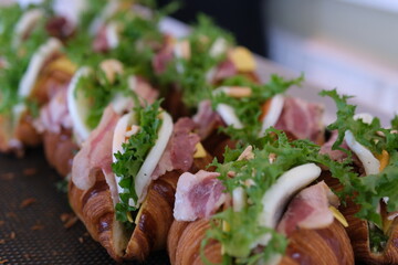 stacks of croissant sandwich at wedding. High quality photo