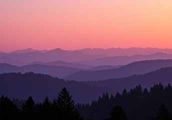 Obraz premium Serene Sunset Over Layered Purple Mountains.