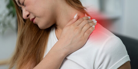 Health Awareness: Young Woman with Shoulder Pain