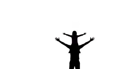 Joyful silhouette Child atop shoulders arms outstretched