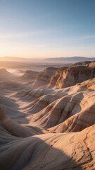Naklejka premium Sandy Badlands at Dawn with Soft Lighting and Layered Formations