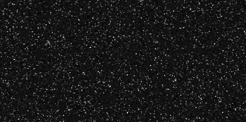 Terrazzo black background with scattered gray and white dots. Rock spatter stone marble backdrop. Black wall texture with noise overlay pattern. Vintage quartz terrazzo flooring.	