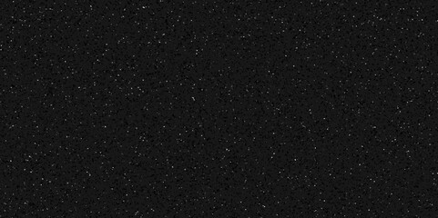 Terrazzo black background with scattered gray and white dots. Rock spatter stone marble backdrop. Black wall texture with noise overlay pattern. Vintage quartz terrazzo flooring.	