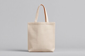 minimalistic image portraying reusable eco-friendly tote bag on neutral background with copy space