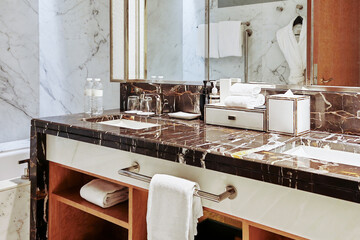Elegant marble bathroom with modern fixtures and luxury amenities in a stylish setting
