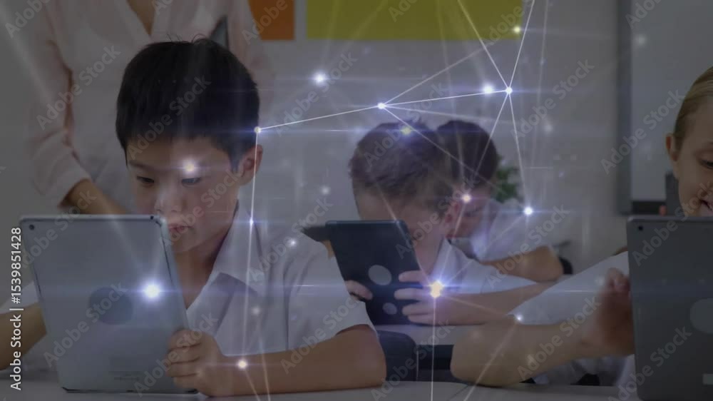 Poster front boy tapping tablet and activating glowing classroom network overlay with teacher monitoring