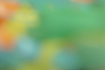 The background features an abstract blurred image with gradients of various colors, green, creating a dreamy and soft bokeh effect. For illustration, banner.