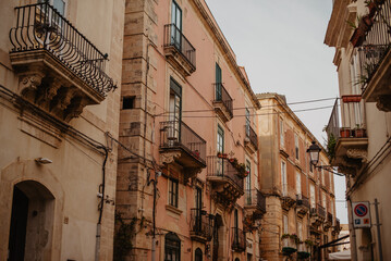 An old building in residential part of Syracuse town on Sicily, Italy