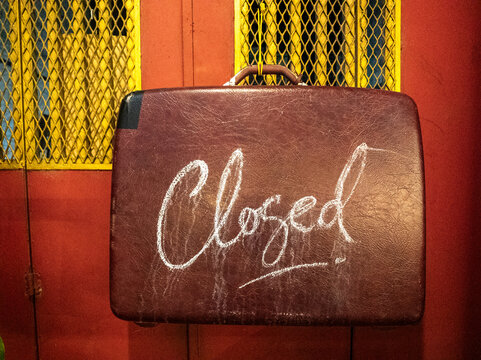 Fototapeta Chalk handwritten closed message in vintage suitcase