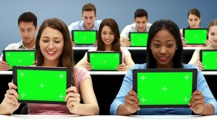 Group of diverse students engaged in a digital learning session using tablets in a classroom setting - Powered by Adobe