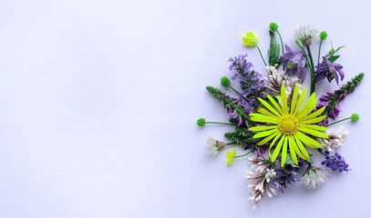 A summer bouquet. Wildflowers. A flower arrangement with a place for text.