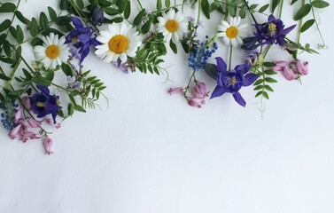 A summer bouquet. Wildflowers. A flower arrangement with a place for text.