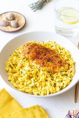 Orzo pasta with roasted chicken breast and curry sauce. Recipe. Healthy eating.