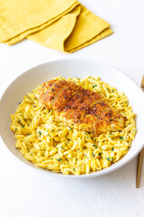 Orzo pasta with roasted chicken breast and curry sauce. Recipe. Healthy eating.
