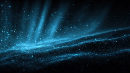Obraz premium Dynamic glowing blue particles and streaks across dark background with starry effect