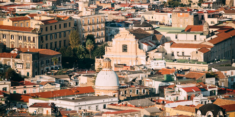 Naples, Italy. Top View Cityscape Skyline With Famous Landmarks In Sunny Day. Many Old Churches And Temples