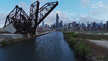 Aerial view following a rowing team passing the Ping Tom park, in Chicago