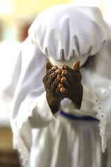 Faithful at sunday service in the Celestial Church of Christ, Missessinto, Benin