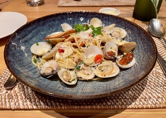 Spaghetti alle vongole is a pasta dish consisting of spaghetti cooked with fresh clams. Traditional dish originating from the coastal regions of southern Italy, Naples and the Campania region.