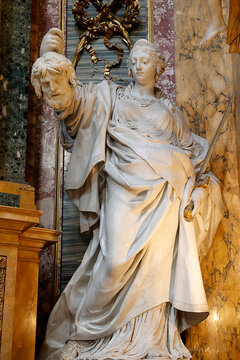 Church of Saints Ambrogio & Carlo, Rome, Italy. Statue depicting Judith holding the head of Holofernes