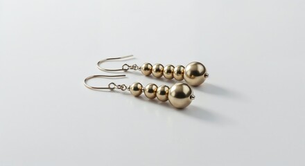 Beaded drop earrings isolated on white background, elegant jewelry, side view, glossy beads