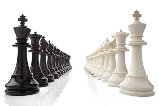 Black and White Chess Pieces Facing Off, Strategy Game
