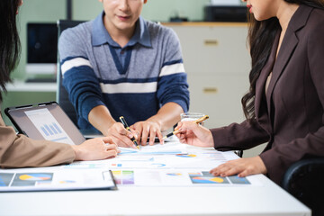 Smart team analyzing financial data with digital reports and charts. Concept of business strategy,...