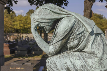 Montrouge cemetery, Paris, France. Statue on a grave