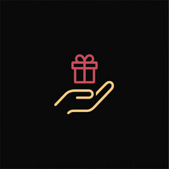 Hand holding a gift box with red ribbon on black background  