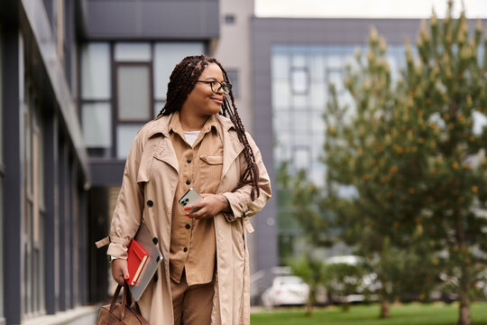 University teacher walking outside, showcasing knowledge and confidence amidst modern architecture
