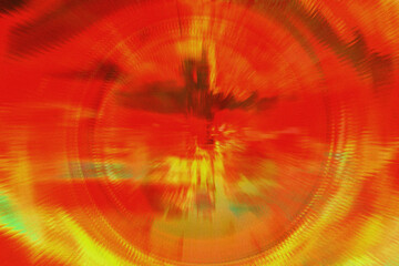 Intense abstract radial blur in fiery red and yellow hues with a vortex effect, dynamic movement, and energetic glow, suitable for gaming or event promotion