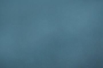 Abstract flat design illustration is showing uniform blue field with subtle grainy texture