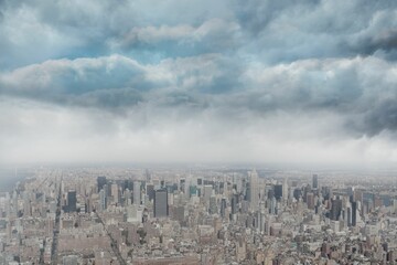 Panoramic aerial city center is being shown in flat design, featuring skyscrapers and grid streets