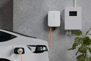 Electric Car Charging with EV charger at home, technology eco green energy.