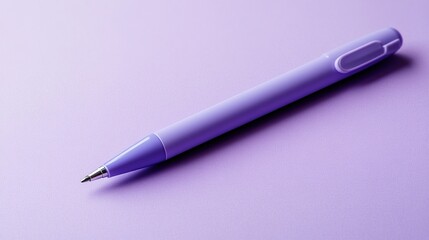 Fototapeta premium A simple pastel-colored pen on a soft lavender surface.