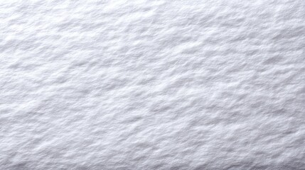 Fototapeta premium Topdown view of a textured snowy surface with crisp edges and subtle details, perfect for winterthemed designs, with ample space for text on the right side