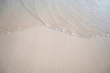 landscape view of beautiful tropical sand beach and sea in sunny day. Beach sea space area, soft focus