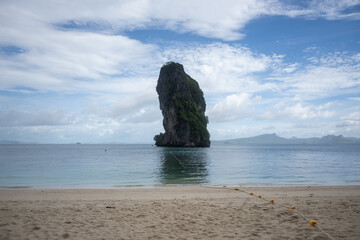 landscape view of beautiful tropical sand beach and sea in sunny day at Krabi, Thailand. Beach sea space area, soft focus
