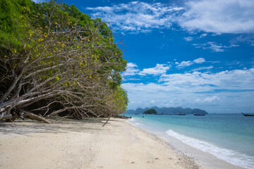 landscape view of beautiful tropical sand beach and sea in sunny day at Krabi, Thailand. Beach sea space area, soft focus