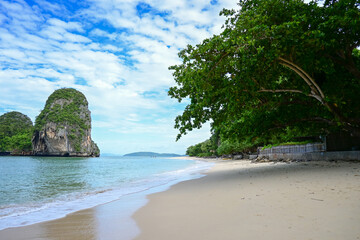 landscape view of beautiful tropical sand beach and sea in sunny day at Krabi, Thailand. Beach sea space area, soft focus