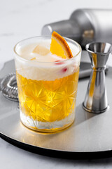 Classic cocktail whiskey sour on white marble background
