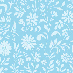 A seamless floral pattern featuring stylized flowers and leaves in soft blue tones. Ideal for fabric, wallpaper, and background design.