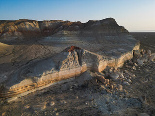 Aerial view over Aktumsuk's unique sandstone formation and red-topped summit