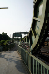 Close-up of an industrial bridge in sunlight with clean lines and shadows. The bascule bridge for...