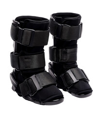 Black orthopedic boots designed for ankle support and rehabilitation. Isolated on transparent white background, png	

