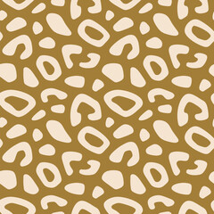 Obraz premium Abstract leopard print. Vector seamless pattern with bold spots, organic shapes. Cut-out style illustration. Animal skin texture, jaguar, cheetah, leo fur. Funky background. Repeated design for print