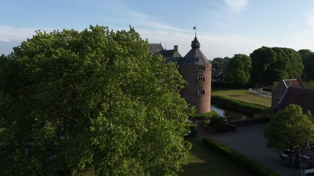 Ammersoyen Castle is a castle in Ammerzoden. Monument, histroic building, tower, walls, aerial video, building exterior.